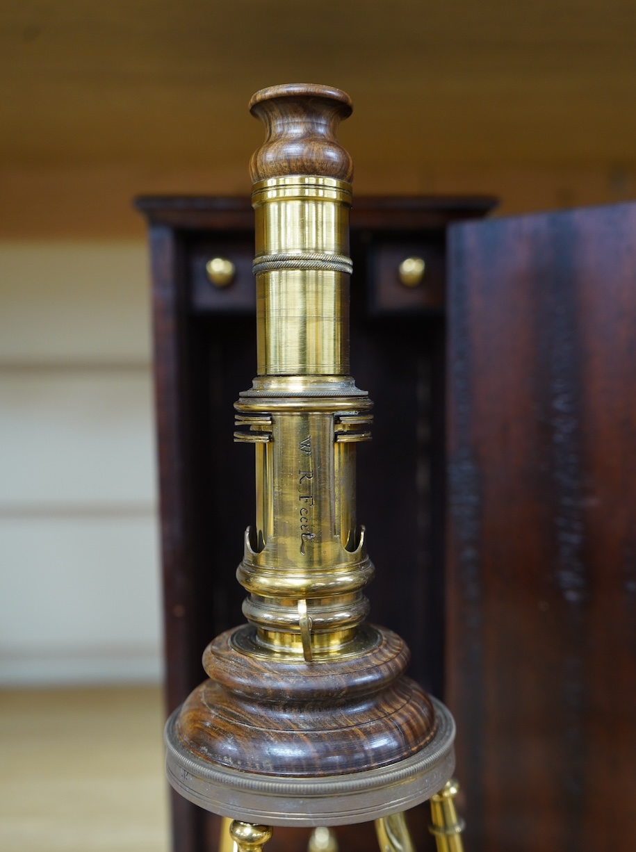 A cased reproduction W.R. Feat 18th century Culpeper style brass microscope, 20cm high, spare lenses in drawer of case. Condition - good.